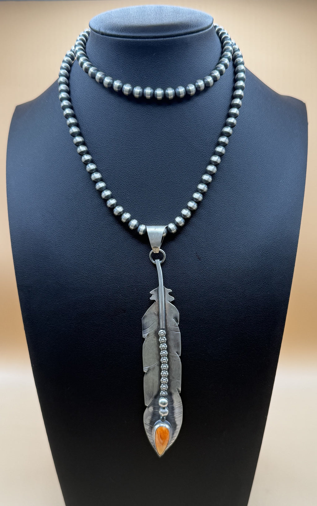 Beautiful Handmade Sterling Silver Feather Pendant with orange Spiny Oyster made by Navajo Artist Miranda Willie