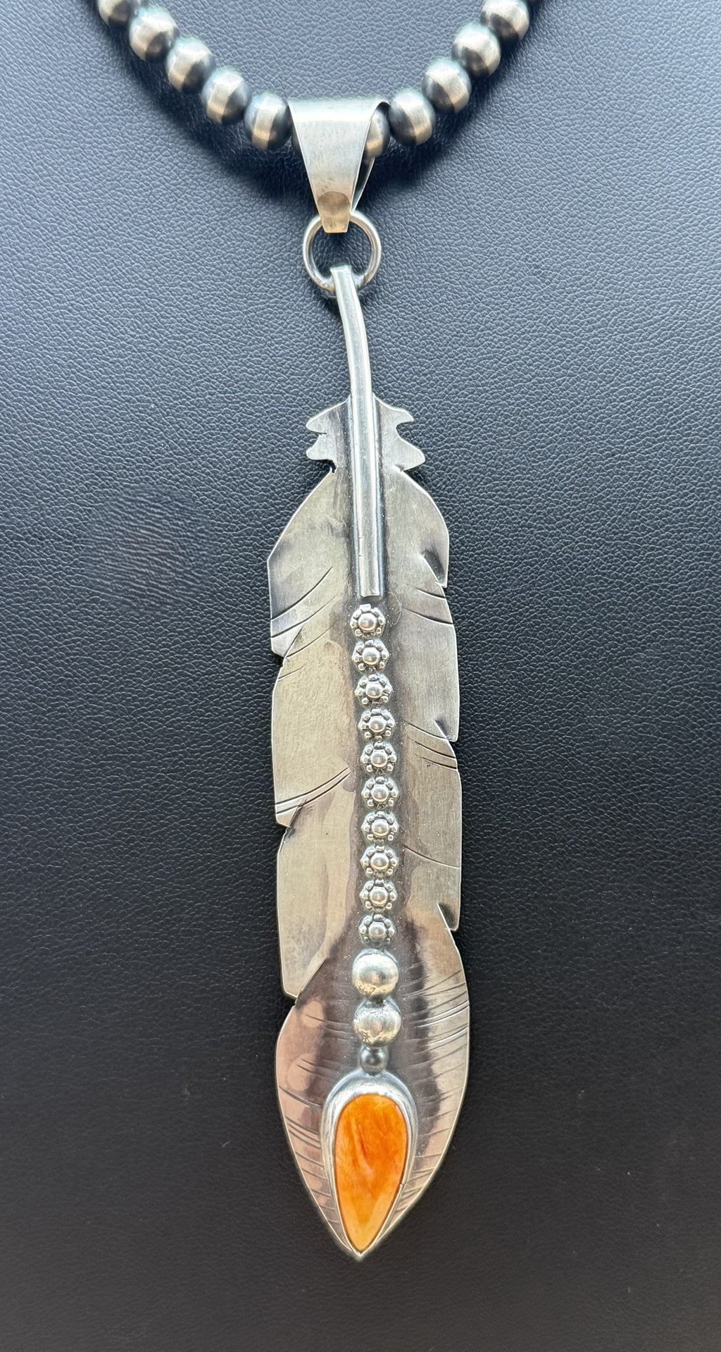 Beautiful Handmade Sterling Silver Feather Pendant with orange Spiny Oyster made by Navajo Artist Miranda Willie